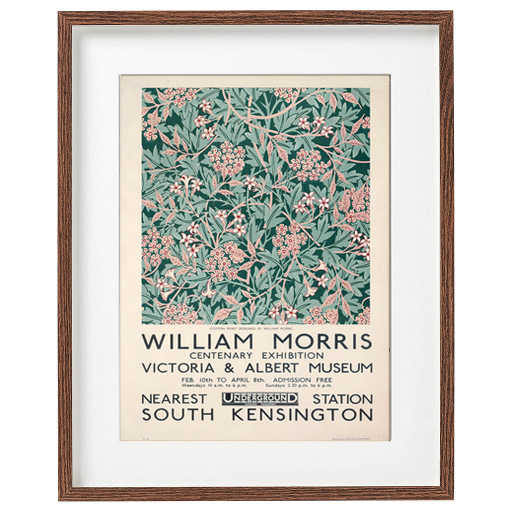 Framed poster with floral design and text about William Morris exhibition at Victoria & Albert Museum.